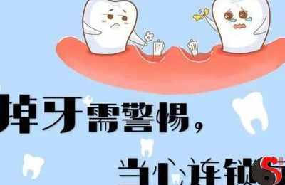 梦见吃饭掉牙